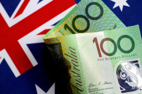 Aussie Dollar nurkuje podążając za bardziej gołębiastym tonem RBA przez Investing.com